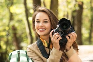 87499016-woman-is-a-professional-photographer-with-photo-camera-outdoor-young-girl-taking-photo-outdoors-with